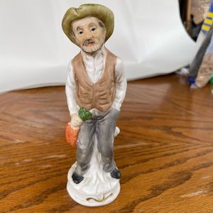 Vintage Crown Deville ceramic man figurine.
